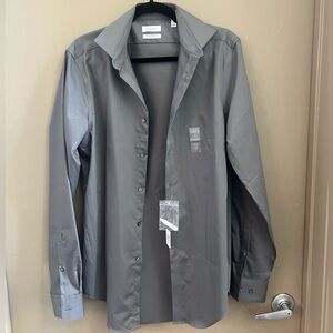 NWT- Calvin Klein Men’s button down shirt - New With Tags! Size 15 34/35